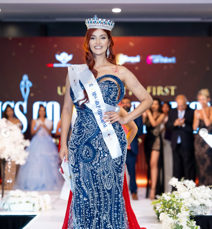 The crowned winner on the finale runway.